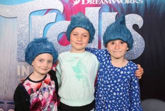 Kids at Trolls Premiere wearing blue wigs